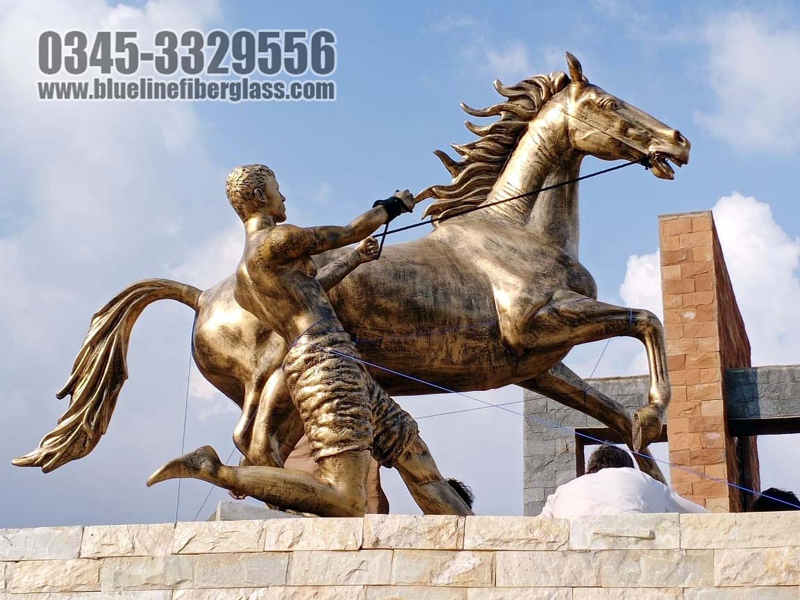 man pulling horse fiberglass statue sculptures monuments karachi pakistan